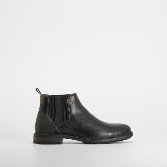Botรญn chelsea clรกsico negro NYC