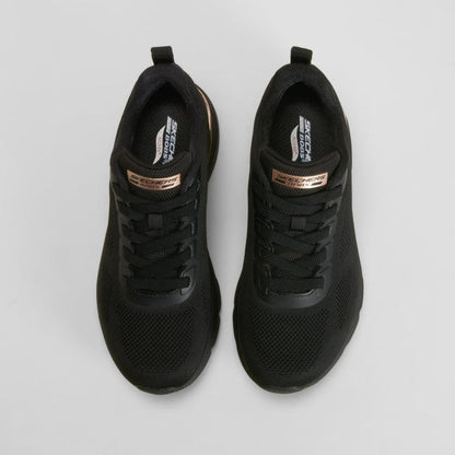 Zapatilla deportiva detalles negra SKECHERS